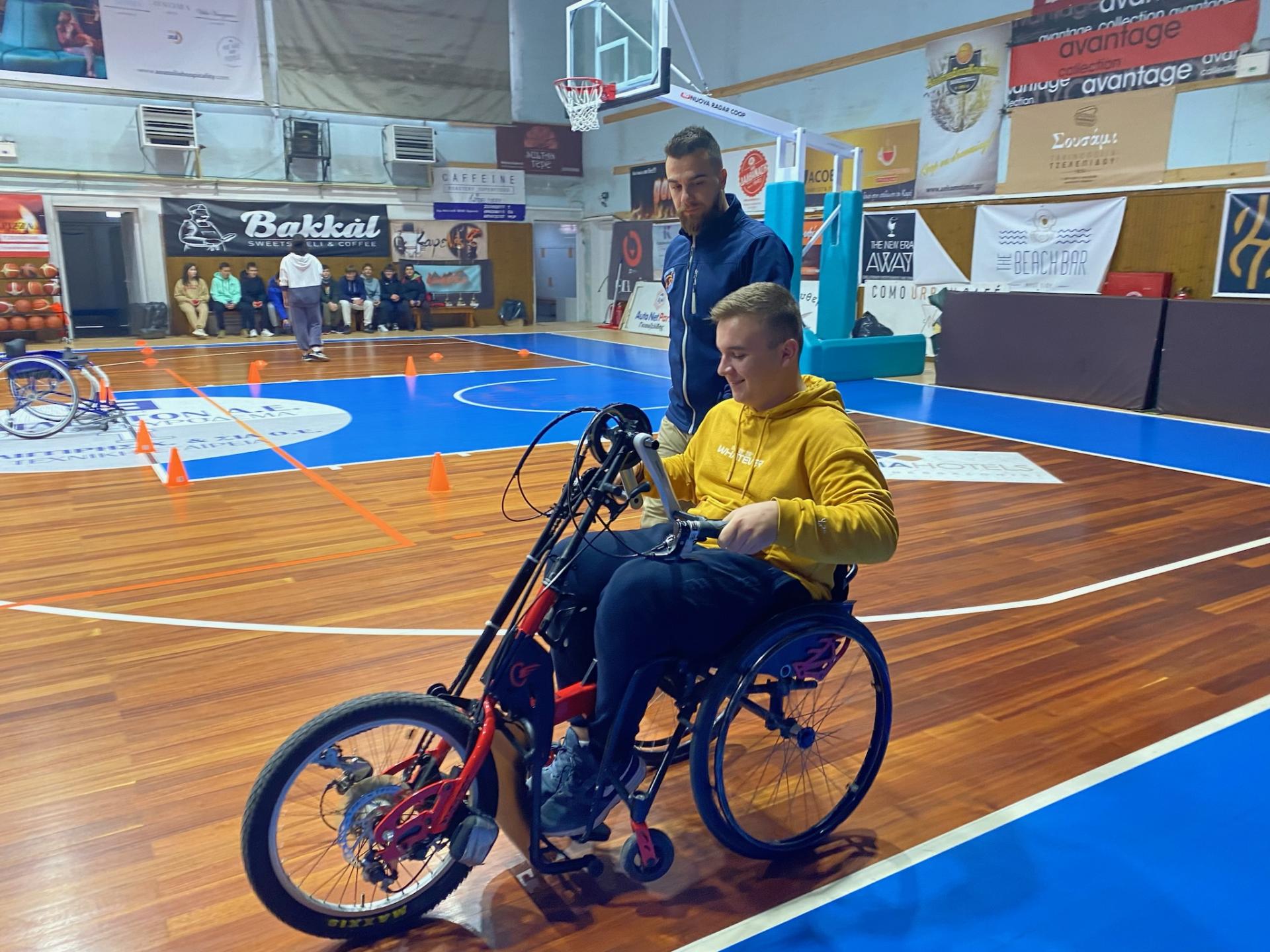 student using hand bike